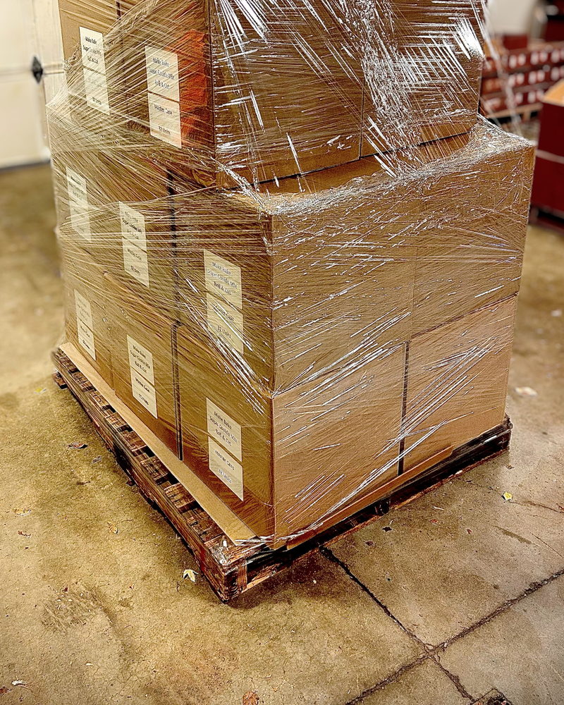 Finished customer product cases wrapped and prepared for freight pickup